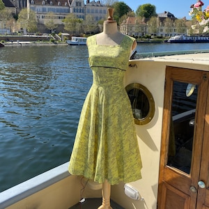 Lovely 1950s yellow toile jouy fit and flare dress!