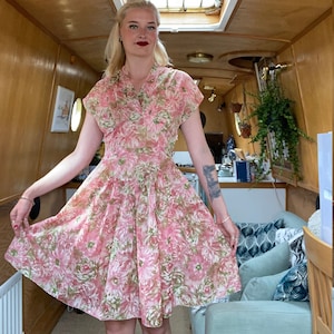 Gorgeous 1950s pink floral nylon fit and flare dress