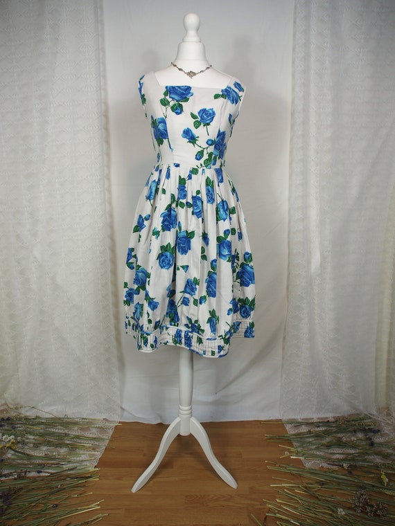 Stunning 1950s blue floral tulip dress