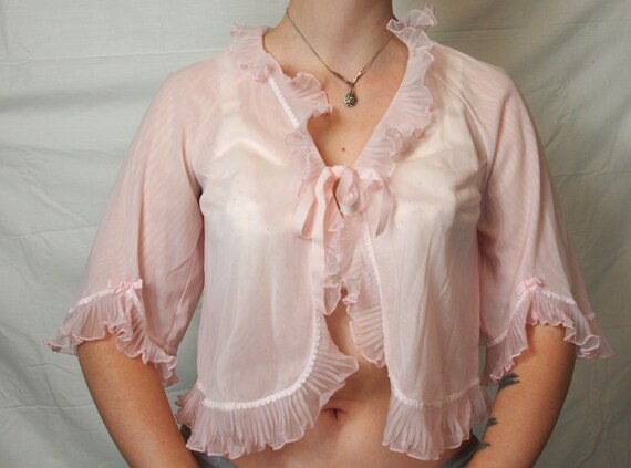 Delicate 1960s nylon pale pink bed jacket