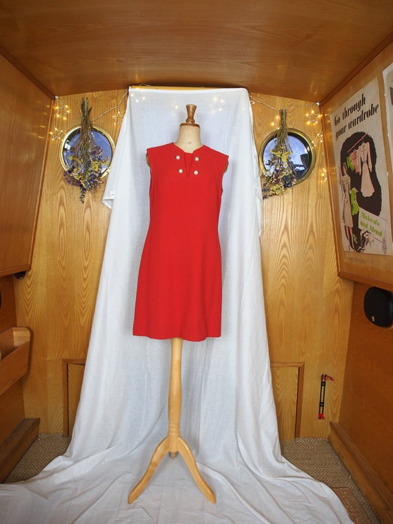 Incredible 1960s "Plutina" bright coral mini trape
