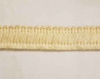 13.5 yards, 1" wide, cream/off white, fringed, rayon upholstery trim
