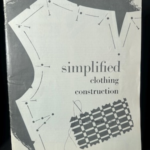 May include: A vintage sewing pattern booklet titled "simplified clothing construction." The cover features a stylized illustration of a clothing pattern, a checkered fabric swatch, and the text "Home and Garden Bulletin No. 19" and "United States Department of Agriculture."