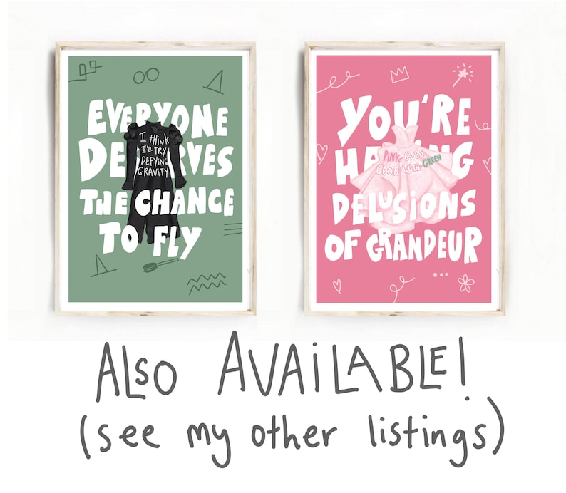 May include: Two framed art prints. One print has a green background with the text "EVERYONE DESERVES THE CHANCE TO FLY" and a black dress illustration. The other print has a pink background with the text "YOU'RE HAVING DELUSIONS OF GRANDEUR" and a dress illustration.