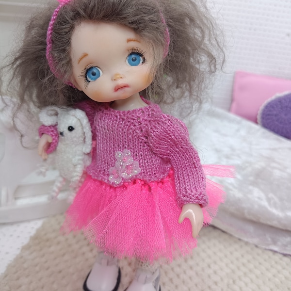 Adorable little doll is the best Christmas gift