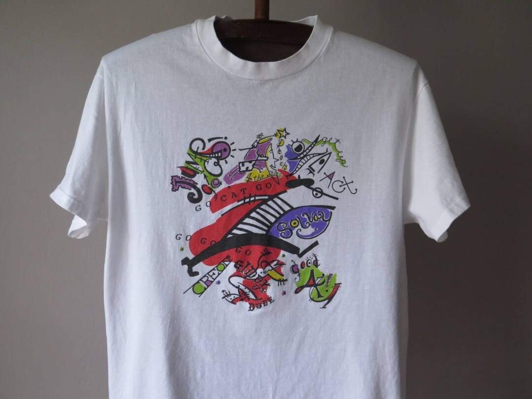 CAROL Golden Hits vinage Tシャツ 古着 90s USA製 Carol Grigg 「Riding Far Boy」 水彩 アート