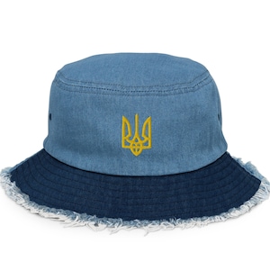 Monogram embellished soft bucket hat in straw, part of the RB X LVR  collection. About Ukrainian nature, about Ukrainian art, about…