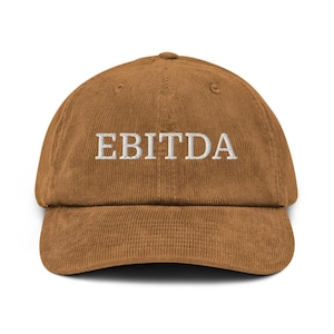 May include: A brown corduroy baseball cap with white embroidered text that reads "EBITDA".