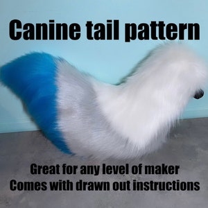 May include: A white and blue faux fur canine tail pattern. The tail is made of white fur with a blue tip. The text "Canine tail pattern" is at the top of the image. The text "Great for any level of maker" and "Comes with drawn out instructions" is at the bottom of the image.