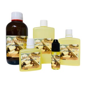 May include: An assortment of Palo Santo fragrance oil bottles in different sizes. The bottles are amber and yellow, with white labels displaying text and images of Palo Santo wood. The labels read "Palo Santo Fragrance Oil."