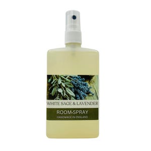 May include: A rectangular room spray bottle with a white spray nozzle. The label features an image of white sage and lavender sprigs. The text on the label reads "WHITE SAGE & LAVENDER ROOM-SPRAY HANDMADE IN ENGLAND."