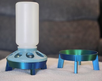 Elevador para comedero de pollitos