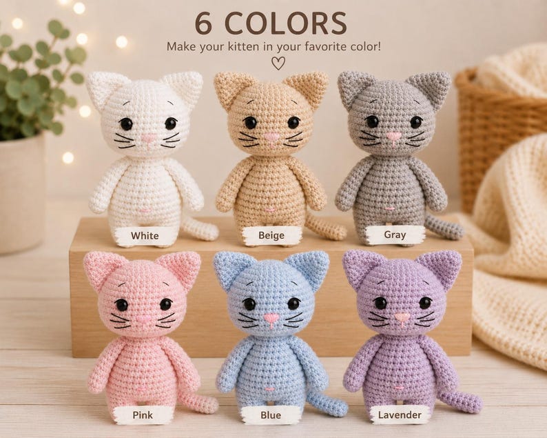 May include: Six crocheted kitten figurines in white, beige, gray, pink, blue, and lavender. Each cat has black eyes, a pink nose, and stitched whiskers. The text 6 COLORS Make your kitten in your favorite color! appears above the kittens.