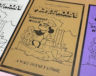 May include: A vintage comic book cover featuring Mickey Mouse in a steamboat, with the text "Disney Cartoons present Mickey Mouse" and "A Walt Disney Comic".