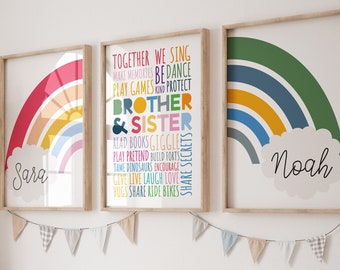 May include: Two rainbow-themed prints with the names "Sara" and "Noah" in white clouds. The prints feature a rainbow with a sun and a list of words in different colors, including "brother", "sister", "share secrets", and "ride bikes".
