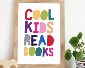 May include: A framed print with the text "COOL KIDS READ BOOKS" in colourful, rounded letters. The letters are in various colours, including red, orange, yellow, green, blue, purple, and pink.