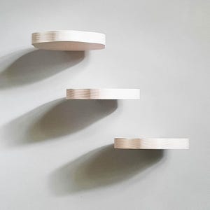 White wavy wall plant shelves. Modern floating shelf with scalloped edges. Danish pastel. Colorful boho decor from Ukraine