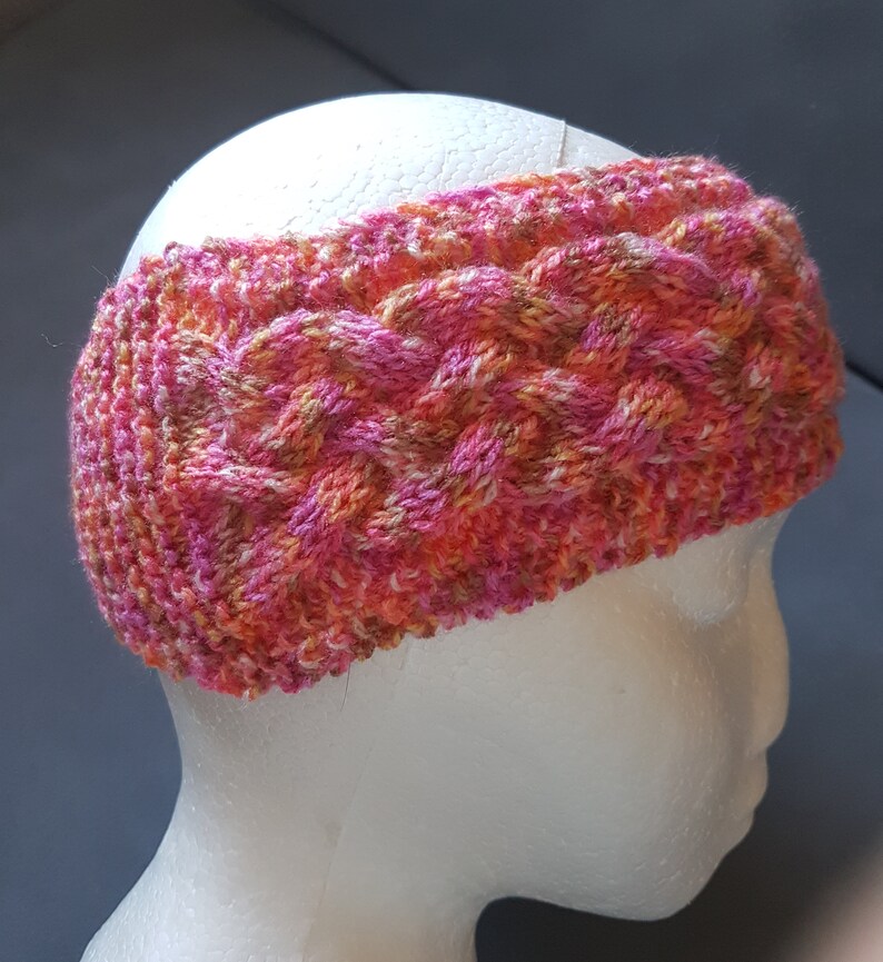 Hand Knitted Ladies Cable Head Band Ear Warmers in bright multi coloured double knitting acrylic yarn
