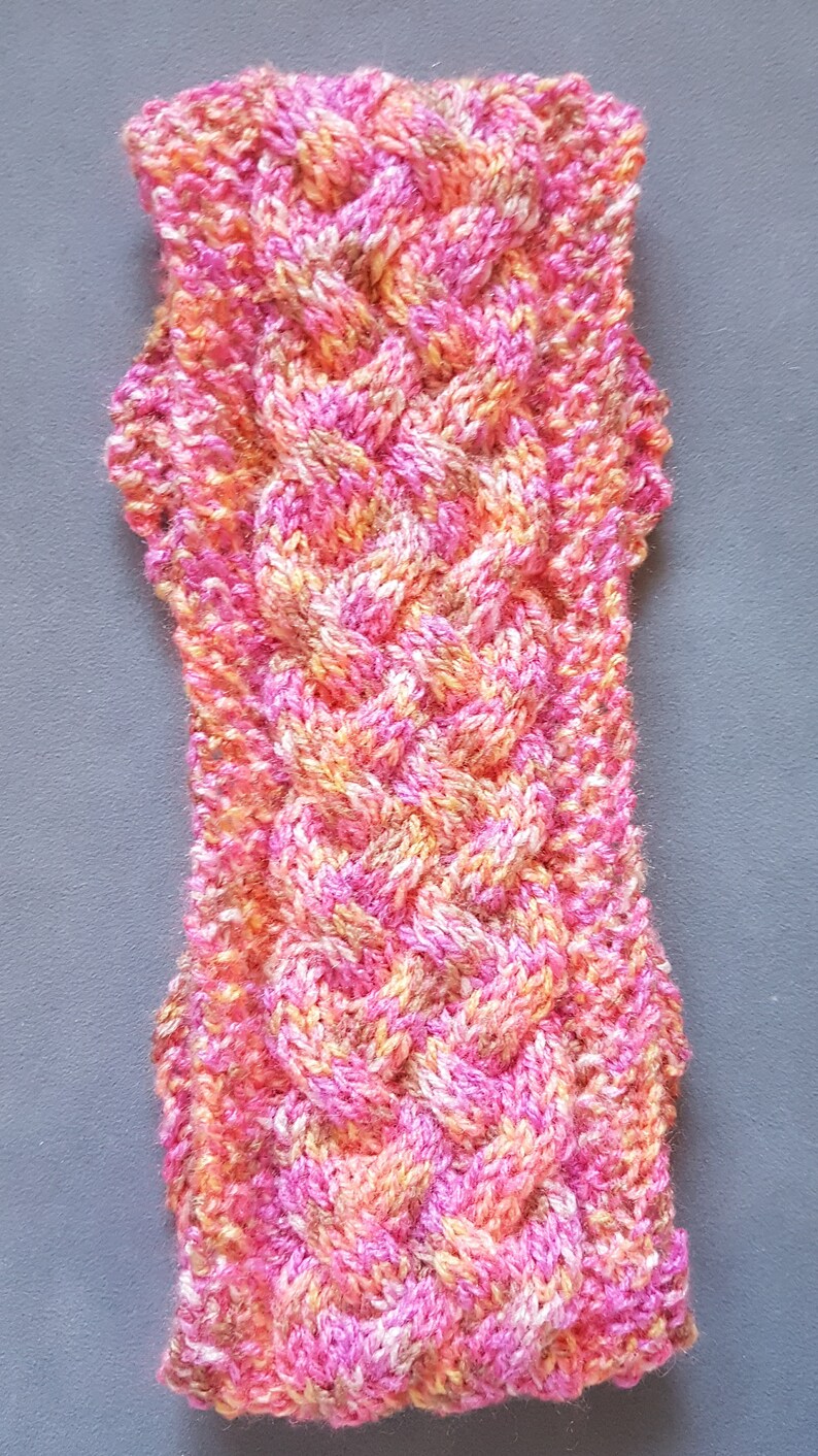 Hand Knitted Ladies Cable Head Band Ear Warmers in bright multi coloured double knitting acrylic yarn