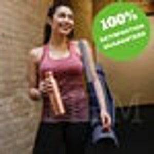 May include: A woman wearing a pink tank top and black trousers is walking down a corridor. She is carrying a reusable water bottle and a black yoga mat. The bottle is made of stainless steel and has a copper finish. The text "100%  sustainable  goodness" is printed on a green circle sticker.