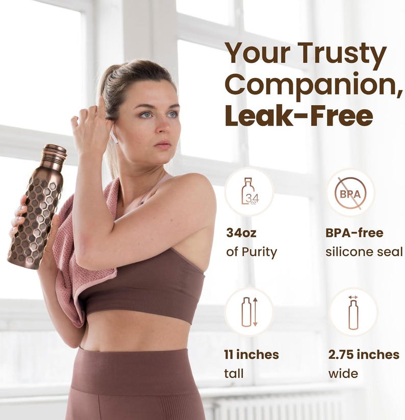 May include: A copper-colored water bottle with a honeycomb pattern is held by a person. The bottle is 11 inches tall and 2.75 inches wide, holding 34 oz. of liquid. The text says "Your Trusty Companion, Leak-Free."