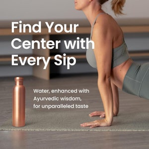 May include: A copper water bottle on a grey yoga mat with a woman in a grey sports bra and leggings doing a yoga pose. The text "Find Your Center with Every Sip" is above the bottle. The text "Water, enhanced with Ayurvedic wisdom, for unparalleled taste" is below the bottle.