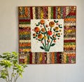 Floral Appliqu\u00e9 Quilted Wall Hanging: Custom Fall Golden Quilt (32x32) product logo