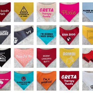 May include: A collection of twenty triangular pet bandanas in various colors including red, yellow, pink, blue, black, and orange. Each bandana features unique printed text or graphics such as names, warning messages, and playful phrases for pets.