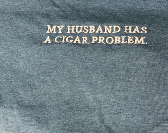 My Husband Has a Cigar Problem – Women’s Relaxed Tee (Bella + Canvas 6400) | Embroidery | Funny Cigar Shirt