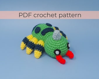 May include: Crochet pattern for a green, yellow, and black spider with red horns. PDF crochet pattern.