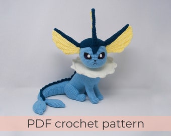 May include: Crocheted blue and yellow Pokemon character with a white frill collar. PDF crochet pattern.