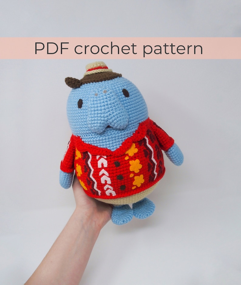 May include: Crochet pattern for a blue manatee wearing a red and brown sweater with a brown hat. PDF crochet pattern.