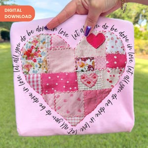 May include: A pink fabric item with a patchwork heart design. The heart is composed of various pink fabrics, including floral and polka dot patterns. The text "Let all you do be done in love" is printed around the heart. The words "DIGITAL DOWNLOAD" are in the upper left corner.