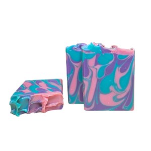 May include: Three bars of handmade soap with a swirl pattern in shades of pink, purple, and teal.