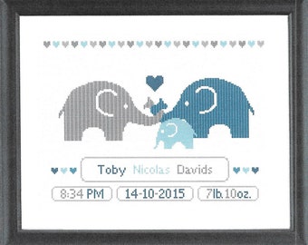 May include: A cross-stitch design featuring two elephants, one gray and one blue, holding a smaller blue elephant. The elephants are surrounded by hearts. The text "Toby Nicolas Davids", "8:34 PM", "14-10-2015", and "7lb 10oz." is included.