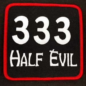 May include: Black square patch with red stitching around the edges. The patch has white text that reads "333 HALF EVIL".