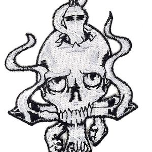 May include: Embroidered patch featuring a skull design with a helmet and tentacles. The skull is white with black detailing, and the tentacles and helmet are outlined in black. The patch has a detailed, textured appearance.