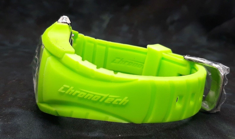 May include: A bright green watch with a silver buckle and the word "Chronotech" printed on the band.
