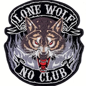 May include: Embroidered patch with a black background and a snarling wolf's head in the center. The wolf has red eyes and a white muzzle. The text "Lone Wolf No Club" is embroidered in white on a black banner.