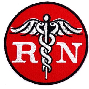 May include: A round, red patch with a black border. The patch features a white caduceus symbol with wings and the letters "RN" in white. The design is embroidered.