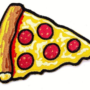 May include: A yellow and red embroidered iron-on patch of a pizza slice with pepperoni.
