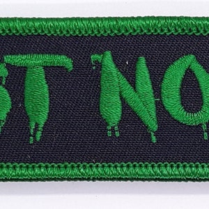 Trust No One - Green & Black Logo Sew-On Iron-On Embroidered Patch  5 7/8"" X 1 1/4"