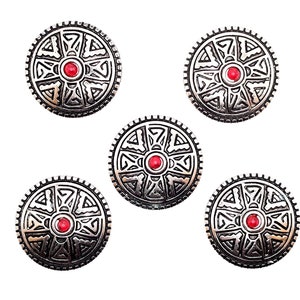 May include: Five silver-toned metal buttons with a red center and intricate geometric designs.