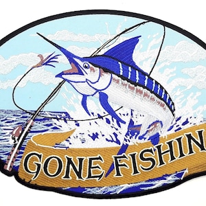 May include: Embroidered patch featuring a blue marlin leaping from the water, with a fishing rod and line. The patch has a light blue sky background with white clouds and the words "GONE FISHING" on a gold banner.