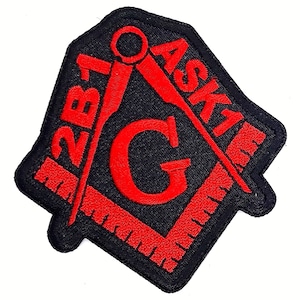May include: Red embroidered patch with a black background featuring a compass and square, a 'G' in the center, and the text 'ASK' and '2B1'.