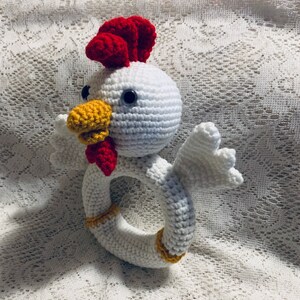 Crochet Rooster Baby Ring Pattern. Digital pdf file in English with US terms.