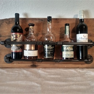 Industrial reclaimed wood whiskey/wine shelf