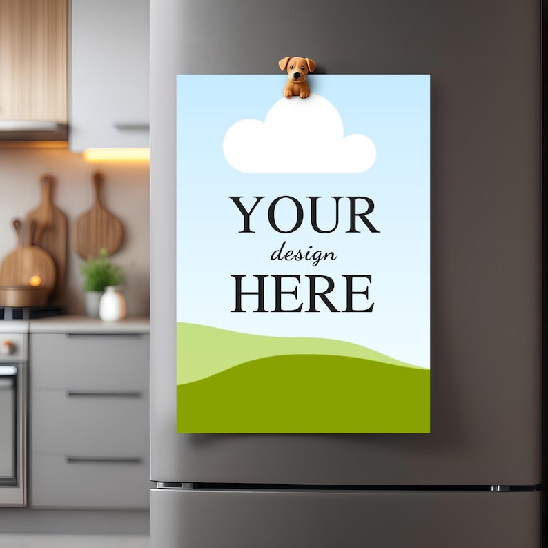 May include: A rectangular sign held by a small brown dog magnet on a grey refrigerator. The sign features a light blue sky, a white cloud, and a green grassy hill. The text "YOUR design HERE" is printed in black in the centre of the sign.