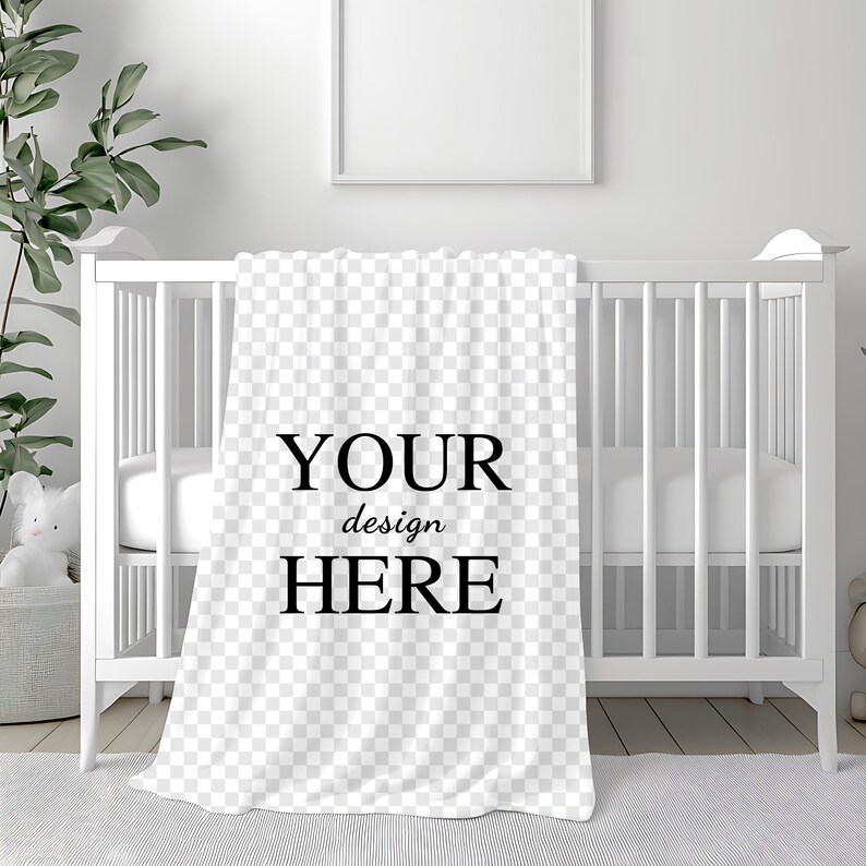 K&ouml;nnte beinhalten: Wei&szlig;e Babydecke mit kariertem Muster und dem Text "YOUR design HERE" in Schwarz.