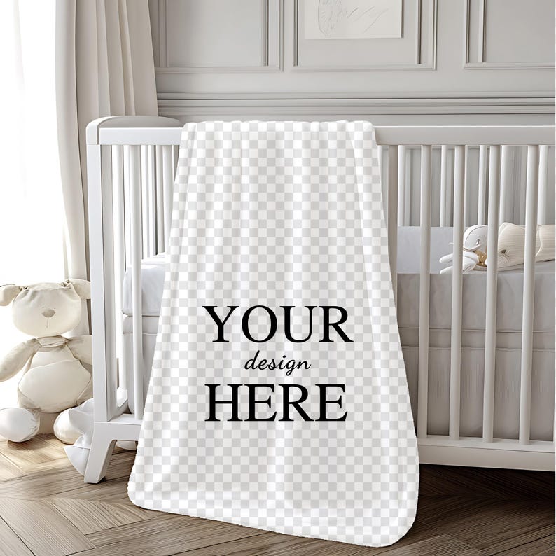 K&ouml;nnte beinhalten: Wei&szlig;e Babydecke mit einem karierten Muster und dem Text "YOUR design HERE" in Schwarz gedruckt.
